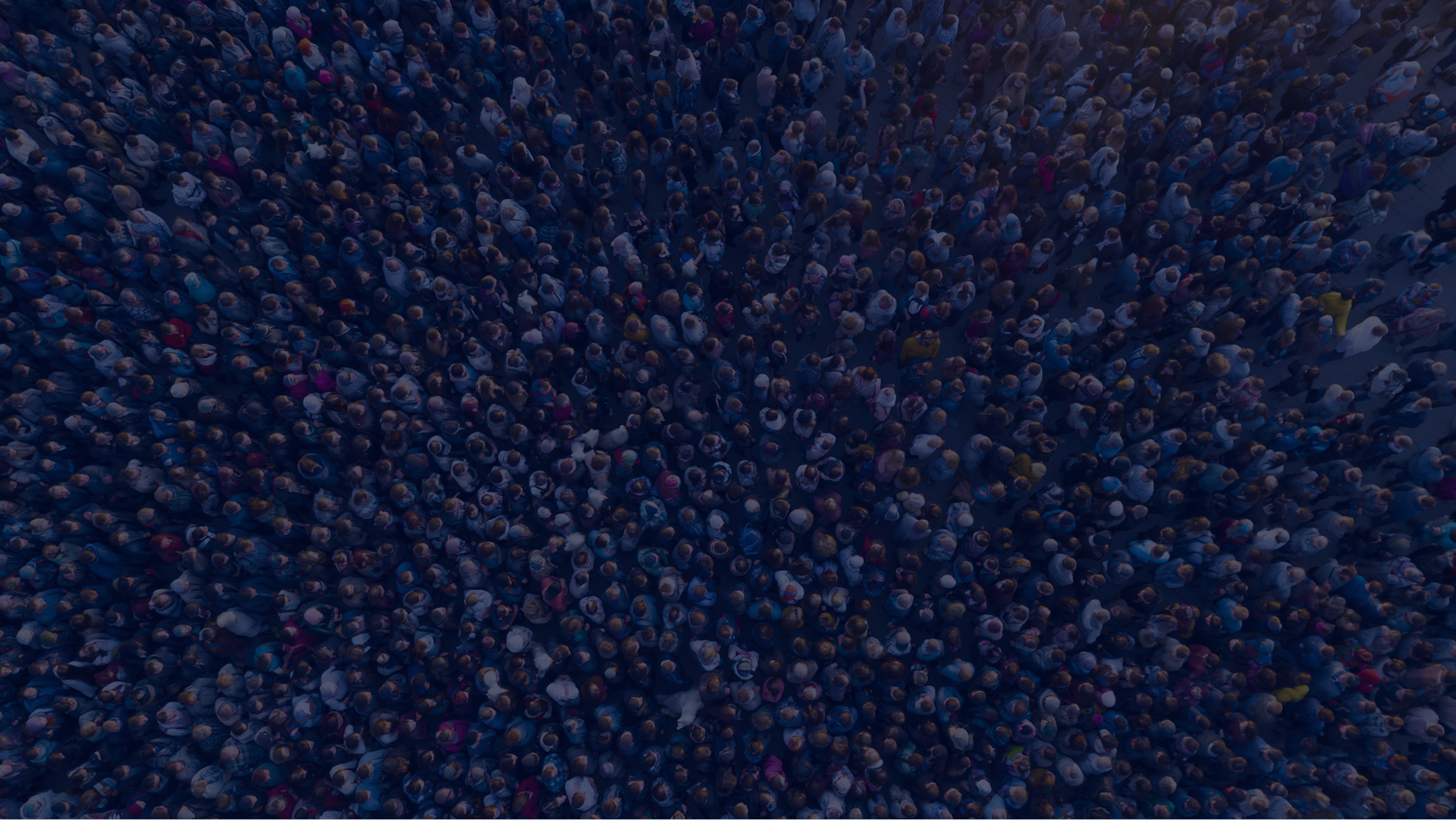 Aerial view of large crowd of diverse individuals.